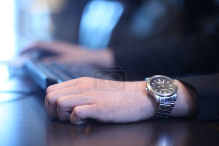 Photo for Computer Mouse in a hand of office worker - Royalty Free Image