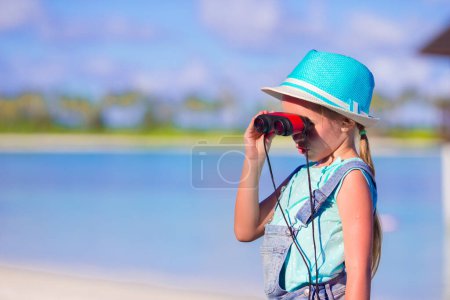 Photo for Adorable little girl with red big surfboard on tropical white beach - Royalty Free Image