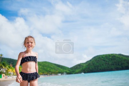 Photo for Portrait of adorable little girl at beach on her summer vacation - Royalty Free Image