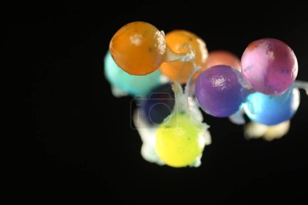 Photo for Close-up view of Colorful Gel Sweets on Black Background - Royalty Free Image