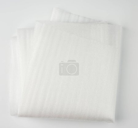 Photo for Folded foam polyethylene for packing and transporting fragile go - Royalty Free Image