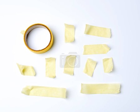 Photo for Set of various pieces of yellow sticky paper tape - Royalty Free Image