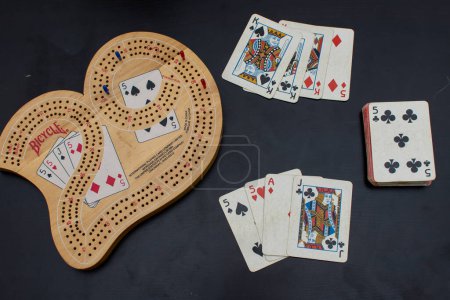 Photo for Cribbage Card Game Best Hand over a game board - Royalty Free Image