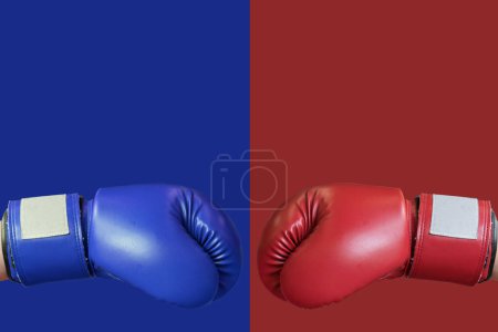 Photo for Boxing gloves in red and blue corner for fight - Royalty Free Image