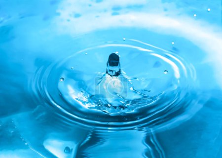 Photo for Water splashes close-up. Falling drop of water. Blue water drop - Royalty Free Image