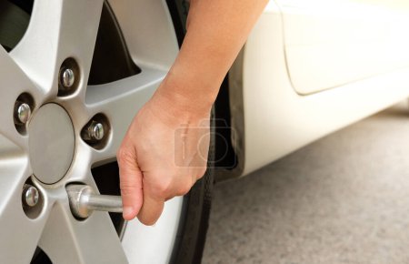 Photo for Woman 's hand with a wheel of car - Royalty Free Image