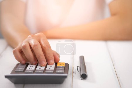 Photo for Woman hand with calculator, finance concept - Royalty Free Image