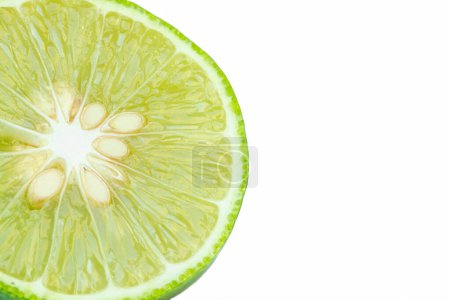 Photo for "Close up green lemons with half  isolated on white background" - Royalty Free Image