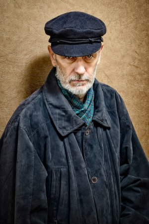 Photo for "Portrait of a Man with Beard and a Cap" - Royalty Free Image