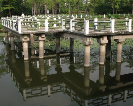 Photo for Chinese Zigzag-Bridge above pond - Royalty Free Image