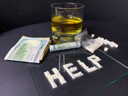 Photo for Pills, us dollar banknotes, whiskey and cocaine  on a gray background - Royalty Free Image