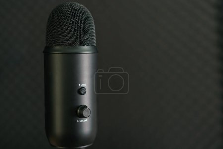 Photo for Close-up of professional condenser microphone on a black backgroUND - Royalty Free Image