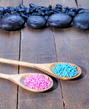 Photo for Bath salts in spoons on table - Royalty Free Image