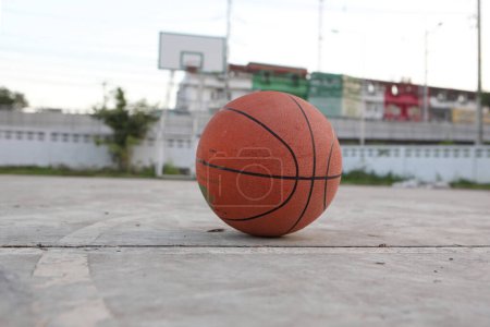 Photo for Basketball ball on street - Royalty Free Image
