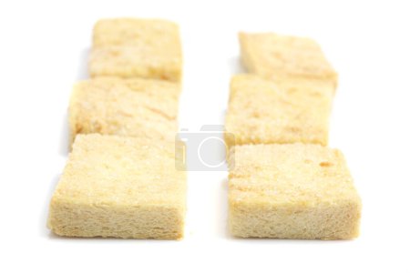 Foto de Cubos de caña de azúcar sobre un fondo blanco
. - Imagen libre de derechos