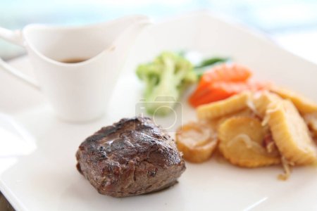Photo for Juicy steak on plate - Royalty Free Image