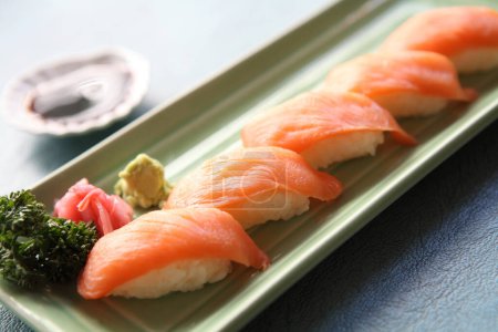 Photo for Salmon Sushi. Tasty Japanese seafood concept - Royalty Free Image