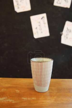 Photo for Cup of Hot green tea on table - Royalty Free Image