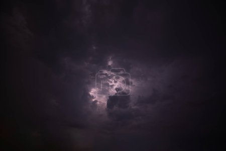 Photo for Lightning and rain clouds at night - Royalty Free Image