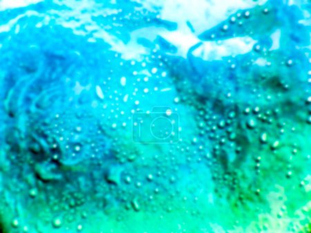 Foto de Desenfoque burbuja de aire y gotas de agua en la piscina - Imagen libre de derechos