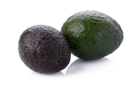 Photo for Green ripe avocadoes isolated on the white background - Royalty Free Image