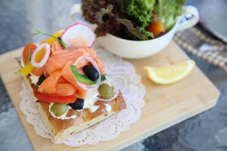 Photo for Smoked salmon on toast with salad - Royalty Free Image