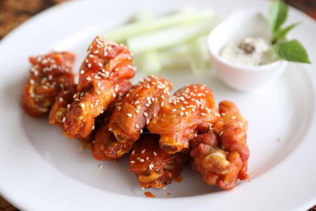 Photo for Buffalo wings , Fried chicken with hot and spicy sauce - Royalty Free Image