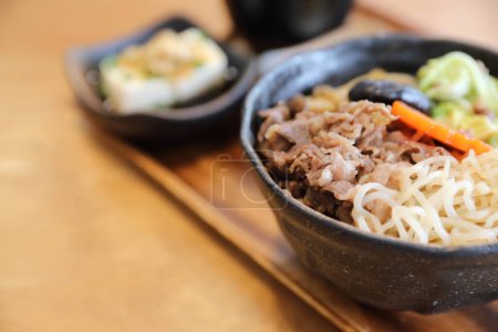 Photo for Sukiyaki donburi , sukiyaki hot pot stew with Japanese rice - Royalty Free Image