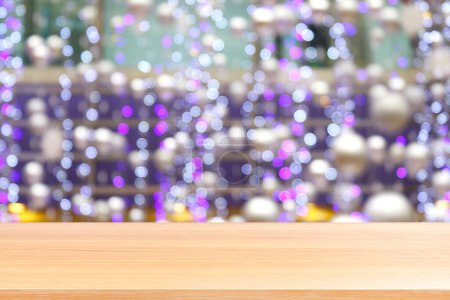 Foto de "wood plank on bokeh purple lighting vivid colorful abstract background, empty wood table floors lighting decoration in shopping mall, wood table board empty front violet bokeh glitter interior light" - Imagen libre de derechos