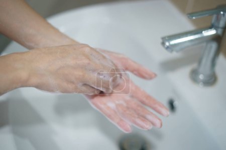 Photo for Washing hands with soap. For killing germs, bacteria and virus. - Royalty Free Image