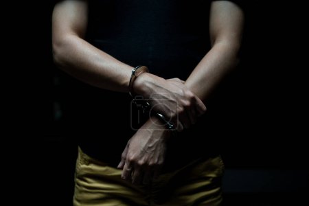 Photo for Handcuffed on a prisoner, Male prisoners were handcuff - Royalty Free Image