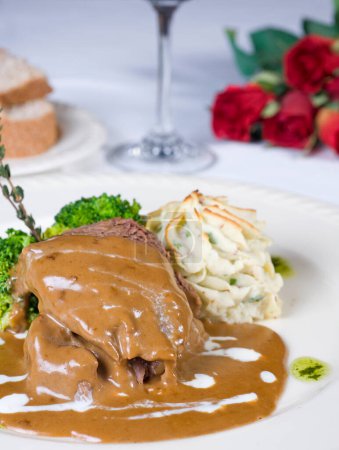 Photo for "Camel steak in gravy a la carte meal" - Royalty Free Image