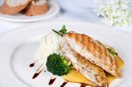 Photo for Grilled chicken breast a la carte meal - Royalty Free Image