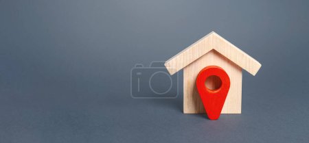 Photo for House and red location pointer. Search for new housing options in the current area. Surrounding infrastructure. Moving to another house. Delivery service directly home. Quarantine mode, stay indoors. - Royalty Free Image