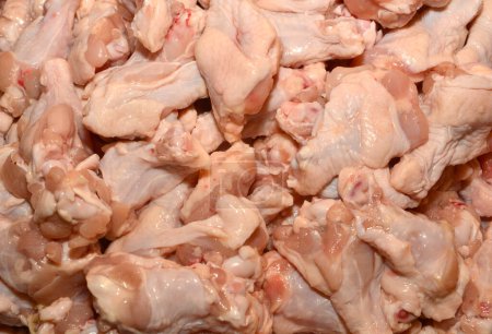 Photo for Fresh Raw Chicken Stack at a Market - Royalty Free Image