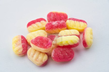 Photo for Pile of Rhubarb and Custard candy on white background - Royalty Free Image