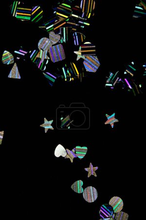 Photo for "Glitter Tinsel Stars Close Up For Background" - Royalty Free Image