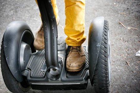 Photo for Male legs in shoes on segway - Royalty Free Image