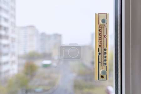 Photo for "Thermometer Attached to the Window" - Royalty Free Image