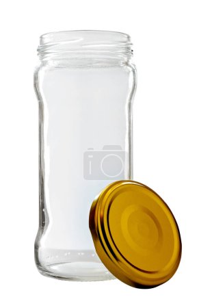 Foto de Tarro de vidrio alto con tapa dorada aislada sobre fondo blanco - Imagen libre de derechos