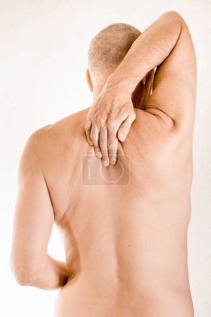 Foto de Hombre que sufre de dolor en las vértebras torácicas - Imagen libre de derechos