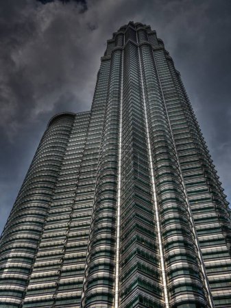 Photo for Petronas Towers in Kuala Lumpur, Malaysia. Traveling through Asia concept - Royalty Free Image