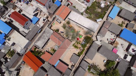 Photo for "Aerial top view of small poor town houses in Gansu, China" - Royalty Free Image
