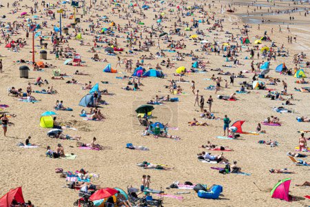 Photo for Crowd on summer beach - Royalty Free Image