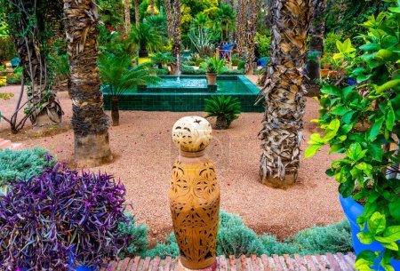 Photo for Morocco, Marrakech,Yves San Laurent Gardens or Le Jardin Majorelle, December 1, 2019: Amazing tropical gardens - Royalty Free Image