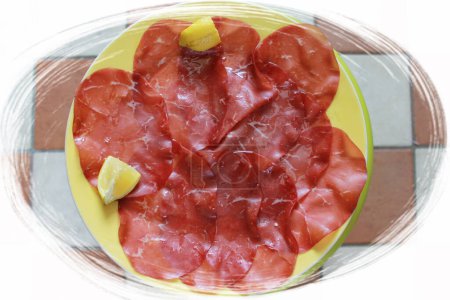 Photo for Sliced cured bresaola, cuisine photo - Royalty Free Image