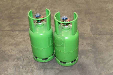 Photo for Green refrigerant gas cylinders, close up - Royalty Free Image
