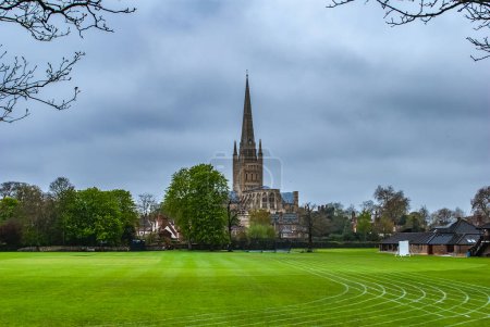 Photo for Norwich Cathedral across playing fields - Royalty Free Image