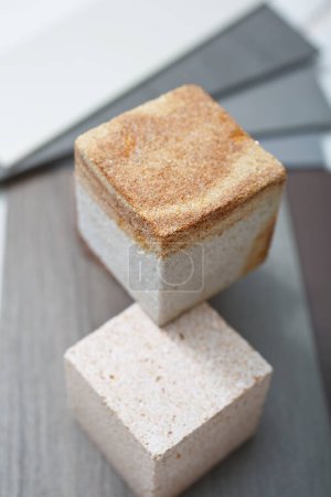 Photo for Two ceramic stone cubes on background, close up - Royalty Free Image