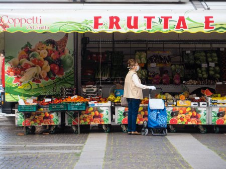 Photo for Cremona, Lombardy, Italy - 16 th may 2020 - People doing grocery shopping during covid-19 - Royalty Free Image